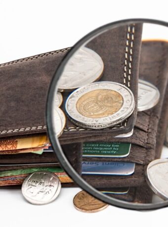 wallet coins magnifying glass 2292428